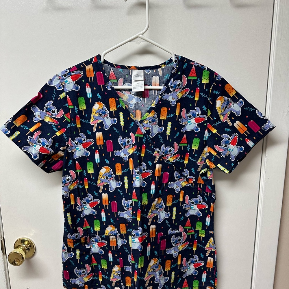 Women’s scrub top, excellent condition.